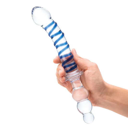 The Twister 10 inch Double Ended Glass Dildo. SKU: GLAS-163. A Long transparent glass diild with a blue twisted raised line running down the shaft like a thin helterskelter. The top has a bulbous head and the shaft curves slightly. About three quarters down the shaft there's a flare that acts as a safety stopper for the anal beads. The bottom quarter of the toy has three glass beads that are joined together in a row. The beads are a small, medium and a large, with the smallest at the bottom tip.
